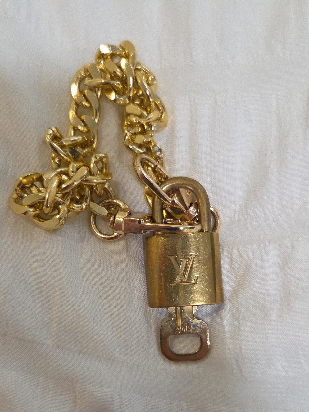Louis Vuitton Gold Padlock With Unbranded Wristlet Chain